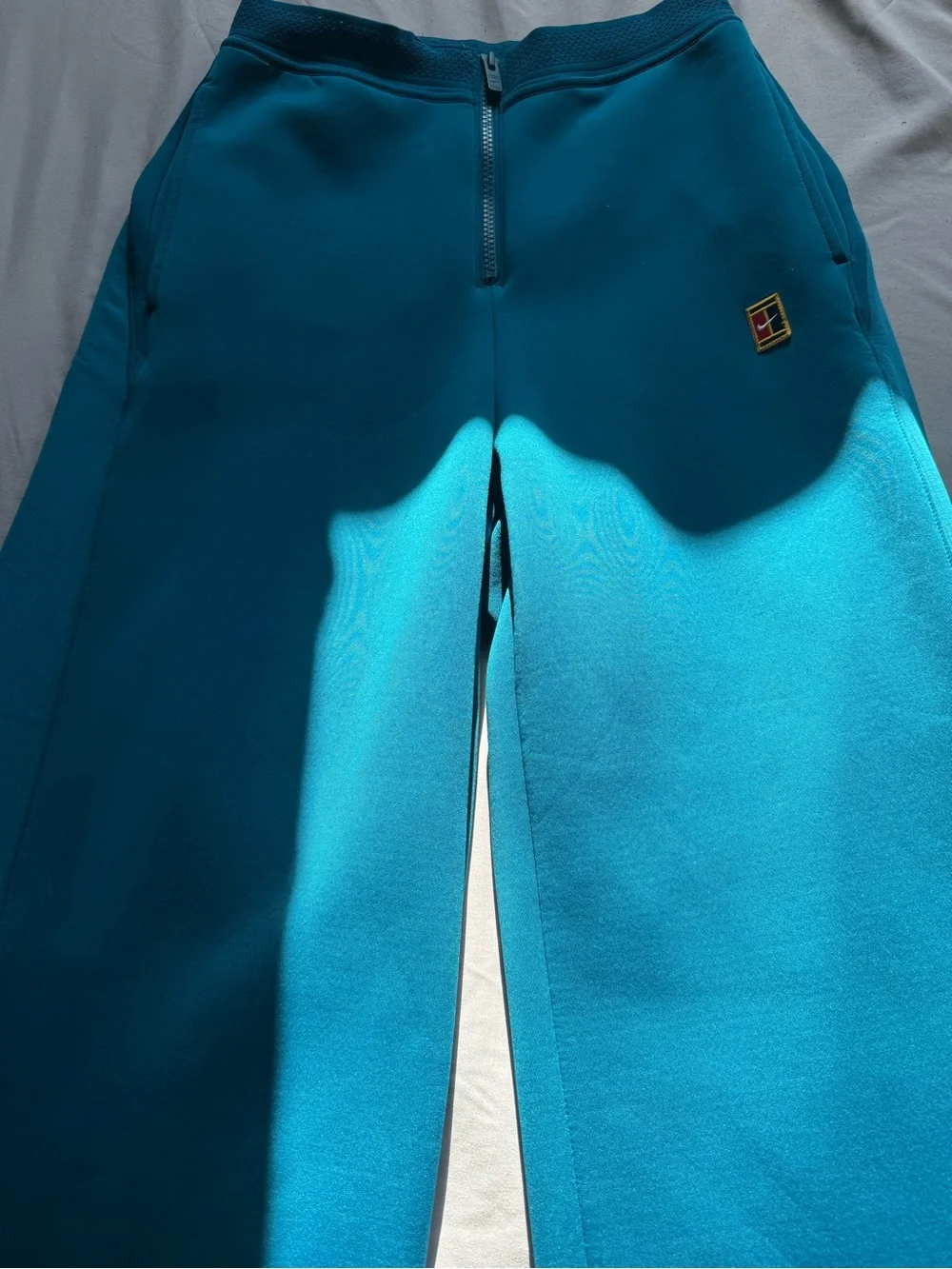 Nike court Dri-fit Women's Teal-Blue Wide-Leg Track Pants